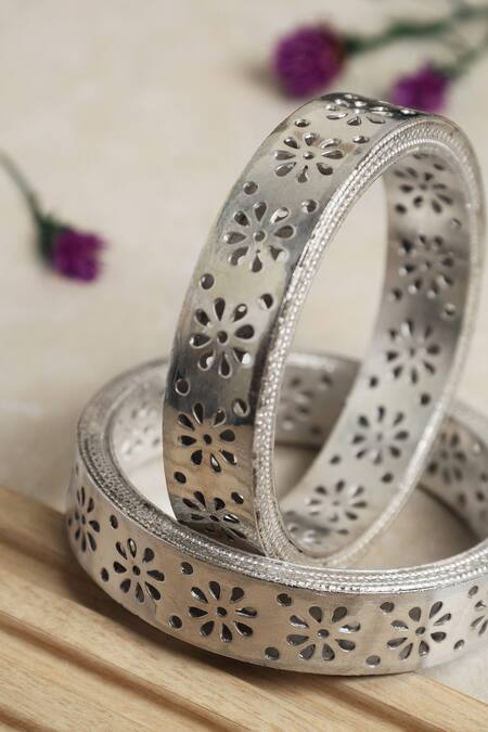 Shop Mero Jewellery Silver Plated Floral Perforated Bangle at Aza Fashions Shop_Mero Jewellery_Silver Plated Floral Perforated Bangle_at_Aza_Fashions
