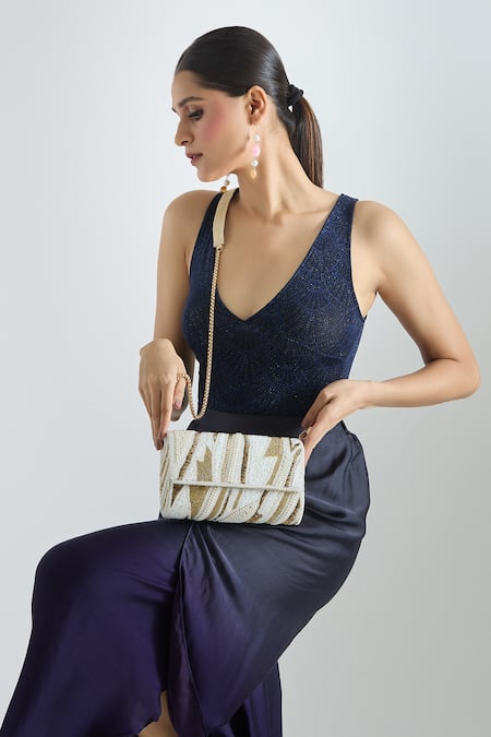Buy Tasna White Cutdana Abstract Embellished Clutch Online at Aza Fashions Buy_Tasna_White Cutdana Abstract Embellished Clutch _Online_at_Aza_Fashions