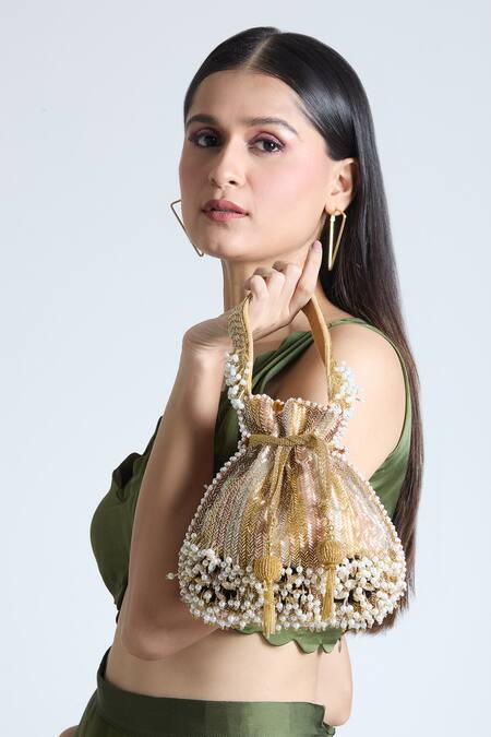 Buy Tasna Gold Cut Work, Pearls Azura Crest Cutdana Embroidered Potli Bag Online at Aza Fashions Buy_Tasna_Gold Cut Work, Pearls Azura Crest Cutdana Embroidered Potli Bag _Online_at_Aza_Fashions
