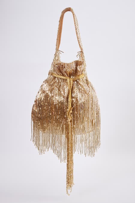 Shop Tasna Gold Cutdana Cosmic Haze Tassel Potli Bag at Aza Fashions Shop_Tasna_Gold Cutdana Cosmic Haze Tassel Potli Bag _at_Aza_Fashions