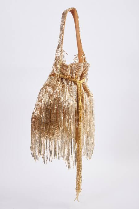 Tasna Gold Cutdana Cosmic Haze Tassel Potli Bag Online at Aza Fashions Tasna_Gold Cutdana Cosmic Haze Tassel Potli Bag _Online_at_Aza_Fashions