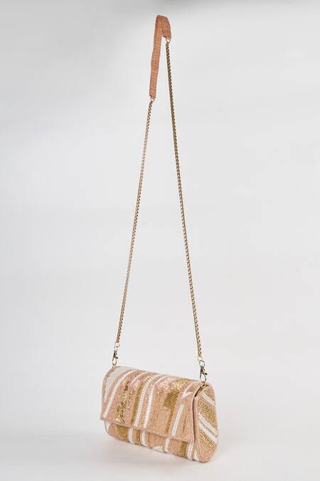 Buy Tasna Rose Gold Cutdana Carme Embellished Sling Bag Online at Aza Fashions Buy_Tasna_Rose Gold Cutdana Carme Embellished Sling Bag _Online_at_Aza_Fashions