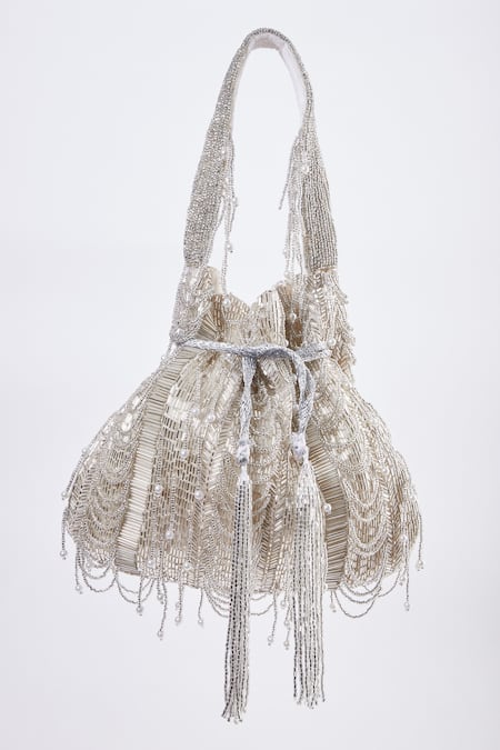 Shop Tasna Silver Crystals, Cut Work Lunar Cutdana Embellished Potli Bag at Aza Fashions Shop_Tasna_Silver Crystals, Cut Work Lunar Cutdana Embellished Potli Bag _at_Aza_Fashions