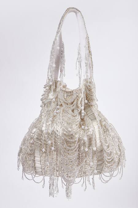 Buy Tasna Silver Crystals, Cut Work Lunar Cutdana Embellished Potli Bag Online at Aza Fashions Buy_Tasna_Silver Crystals, Cut Work Lunar Cutdana Embellished Potli Bag _Online_at_Aza_Fashions