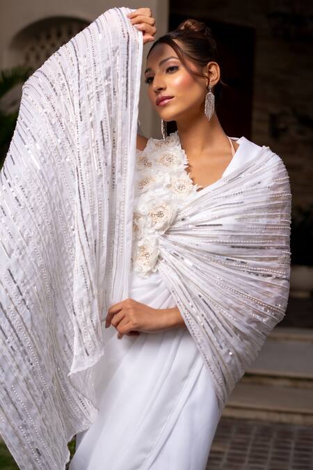 Buy Label Anshu Khathuria Ivory Silk, Chiffon Pearls, Sequins, Stones, Beads V-neck Embroidered Saree Gown Online at Aza Fashions Buy_Label Anshu Khathuria_Ivory Silk, Chiffon Pearls, Sequins, Stones, Beads V-neck Embroidered Saree Gown _Online_at_Aza_Fashions
