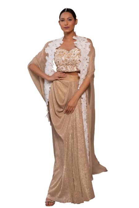 Label Anshu Khathuria Gold Crepe, Georgette, Lycra Beads, Slit Sleeve Cape With Draped Skirt Set at Aza Fashions Label Anshu Khathuria_Gold Crepe, Georgette, Lycra Beads, Slit Sleeve Cape With Draped Skirt Set _at_Aza_Fashions