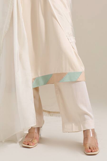 Siyona By Ankurita Ivory Satin Sequins Round Neck Lily Shoulder Embroidered Kurta Set Online at Aza Fashions Siyona By Ankurita_Ivory Satin Sequins Round Neck Lily Shoulder Embroidered Kurta Set _Online_at_Aza_Fashions