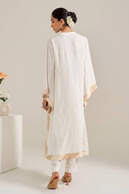 Shop Siyona By Ankurita Ivory Linen, Chanderi Sequins Bandeau Neck Mogra Embroidered Shoulder Kurta Set at Aza Fashions Shop_Siyona By Ankurita_Ivory Linen, Chanderi Sequins Bandeau Neck Mogra Embroidered Shoulder Kurta Set _at_Aza_Fashions