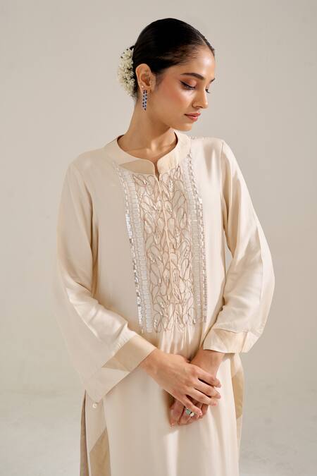 Siyona By Ankurita Ivory Satin Sequins, Embroidery Bandeau Neck Sundari Kurta Set at Aza Fashions Siyona By Ankurita_Ivory Satin Sequins, Embroidery Bandeau Neck Sundari Kurta Set _at_Aza_Fashions