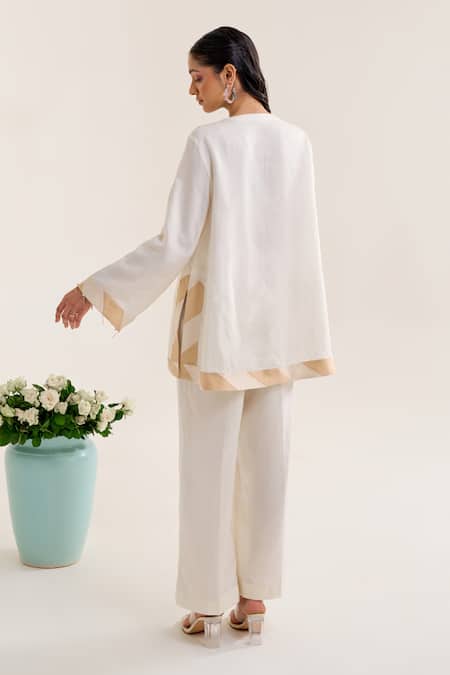 Shop Siyona By Ankurita Ivory Linen Embroidery Sequin Round Chaandni Top With Pant at Aza Fashions Shop_Siyona By Ankurita_Ivory Linen Embroidery Sequin Round Chaandni Top With Pant _at_Aza_Fashions