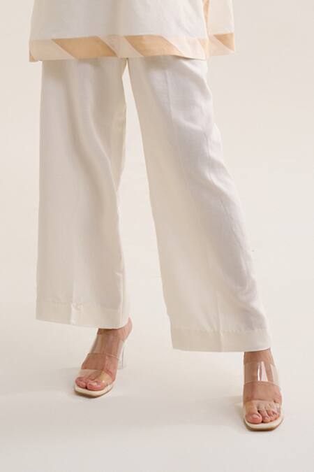 Siyona By Ankurita Ivory Linen Embroidery Sequin Round Chaandni Top With Pant at Aza Fashions Siyona By Ankurita_Ivory Linen Embroidery Sequin Round Chaandni Top With Pant _at_Aza_Fashions