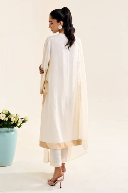 Shop Siyona By Ankurita Ivory Linen, Chanderi Sequins Round Chaandni A-line Embroidered Kurta And Pant Set at Aza Fashions Shop_Siyona By Ankurita_Ivory Linen, Chanderi Sequins Round Chaandni A-line Embroidered Kurta And Pant Set _at_Aza_Fashions