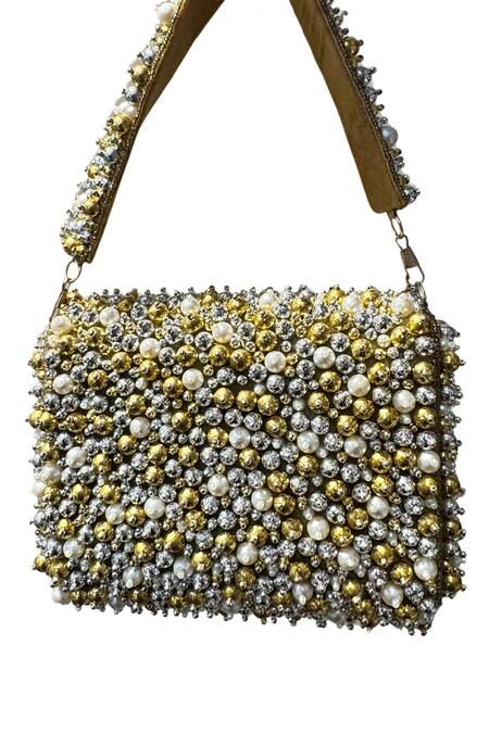Shop Tasna Gold Pearl Embellished Clutch at Aza Fashions Shop_Tasna_Gold Pearl Embellished Clutch_at_Aza_Fashions