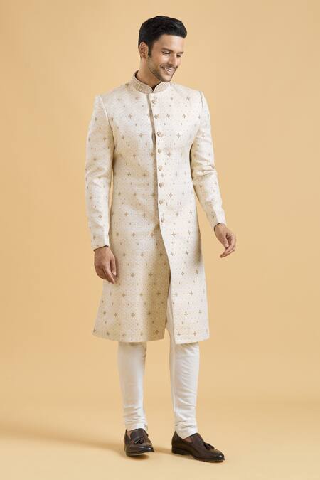 Shop_Arihant Rai Sinha_Cream Brocade, Polyester Embroidery Star Pattern Sherwani With Churidar_Online_at_Aza_Fashions