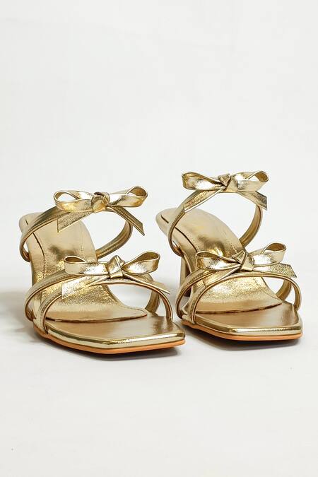 Buy The Alter Gold Bows Solid T-shaped Stiletto Online at Aza Fashions Buy_The Alter_Gold Bows Solid T-shaped Stiletto _Online_at_Aza_Fashions