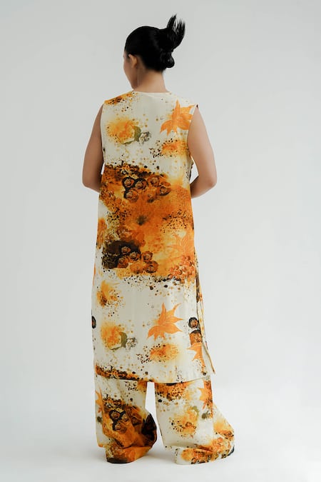 Shop Til Yellow Chanderi V-neck Florid Abstract Print Kurta With Flared Pant at Aza Fashions Shop_Til_Yellow Chanderi V-neck Florid Abstract Print Kurta With Flared Pant _at_Aza_Fashions