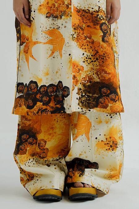 Til Yellow Chanderi V-neck Florid Abstract Print Kurta With Flared Pant Online at Aza Fashions Til_Yellow Chanderi V-neck Florid Abstract Print Kurta With Flared Pant _Online_at_Aza_Fashions