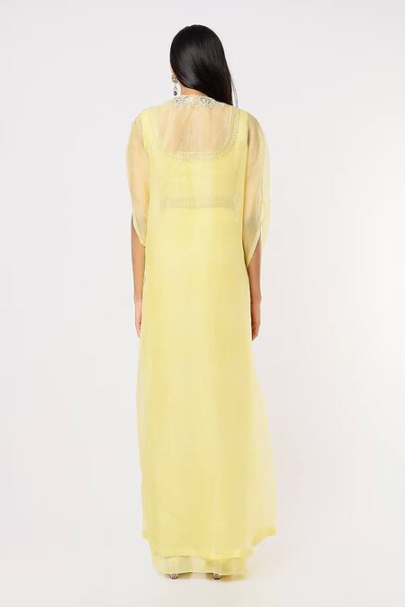 Shop Blue Lotus Design Yellow Organza Embroidery, Sequins Round Floral Border Cape Draped Skirt Set at Aza Fashions Shop_Blue Lotus Design_Yellow Organza Embroidery, Sequins Round Floral Border Cape Draped Skirt Set _at_Aza_Fashions
