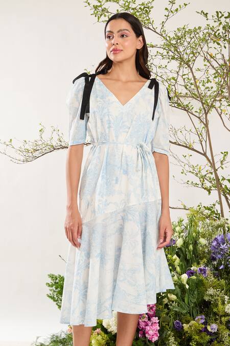 Shop Meadow Blue Cotton Bows V-neck Toile De Jouy Print Asymmetric Dress Online at Aza Fashions Shop_Meadow_Blue Cotton Bows V-neck Toile De Jouy Print Asymmetric Dress _Online_at_Aza_Fashions