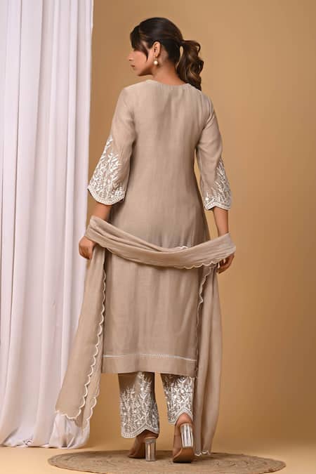 Shop Gulabik Jaipur Beige Chanderi, Handloom Cotton Embroidery Round Neck Floral Kurta And Pant Set at Aza Fashions Shop_Gulabik Jaipur_Beige Chanderi, Handloom Cotton Embroidery Round Neck Floral Kurta And Pant Set _at_Aza_Fashions