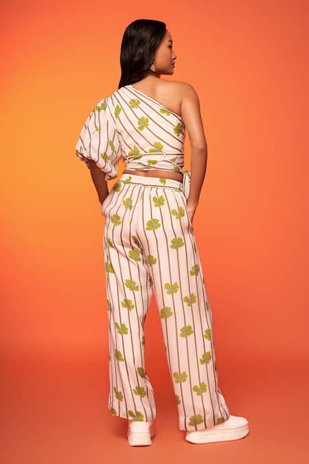 Shop Neetiandmudita Yellow Crepe Silk Print Daisy Asymmetric Neck Upsie Daisies Top With Pant at Aza Fashions Shop_Neetiandmudita_Yellow Crepe Silk Print Daisy Asymmetric Neck Upsie Daisies Top With Pant _at_Aza_Fashions