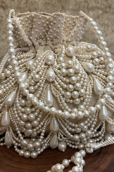 Nayaab By Sonia Ivory Embroidery Velvet Potli Bag Online at Aza Fashions Nayaab By Sonia_Ivory Embroidery Velvet Potli Bag _Online_at_Aza_Fashions