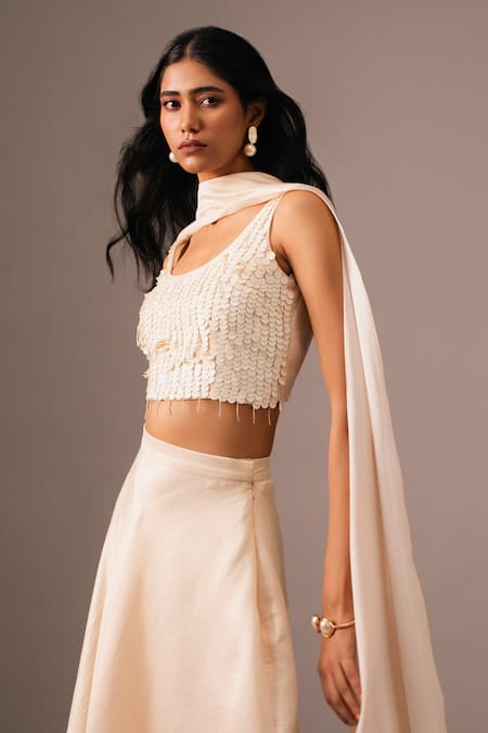 Buy_Vanshika Agarwal Label_Ivory Silk, Brocade Sequins, Tassels Round Neck Embroidered Top And Skirt Set _Online_at_Aza_Fashions