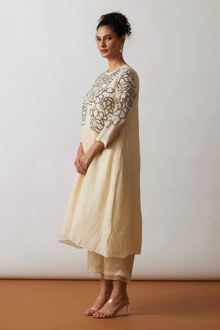 Shop One Not Two Off White Viscose, Silk, Modal, Satin Asymmetric A-line Kurta And Pant Set Online at Aza Fashions Shop_One Not Two_Off White Viscose, Silk, Modal, Satin Asymmetric A-line Kurta And Pant Set _Online_at_Aza_Fashions