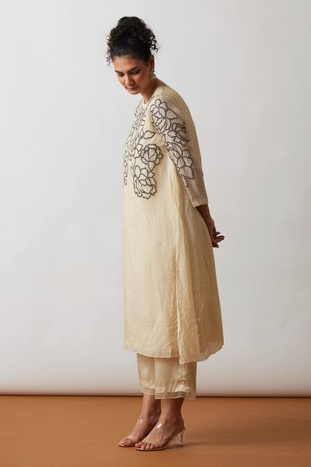 One Not Two Off White Viscose, Silk, Modal, Satin Asymmetric A-line Kurta And Pant Set at Aza Fashions One Not Two_Off White Viscose, Silk, Modal, Satin Asymmetric A-line Kurta And Pant Set _at_Aza_Fashions