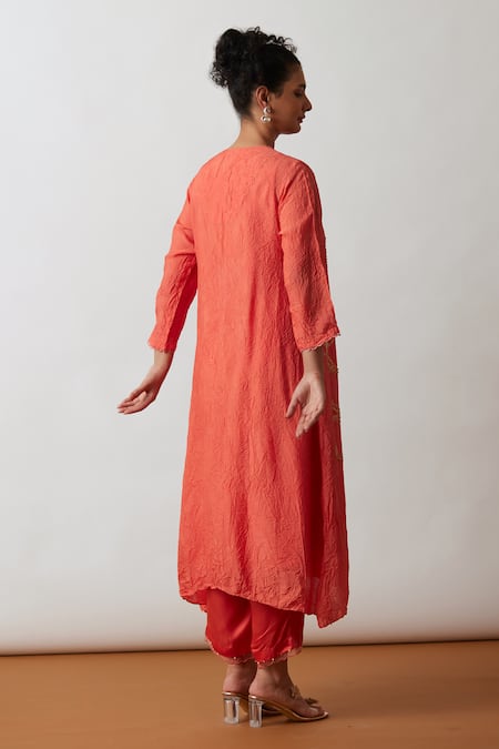 Shop One Not Two Orange Viscose, Silk, Modal, Embroidered Asymmetric A-line Kurta And Pant Set at Aza Fashions Shop_One Not Two_Orange Viscose, Silk, Modal, Embroidered Asymmetric A-line Kurta And Pant Set _at_Aza_Fashions