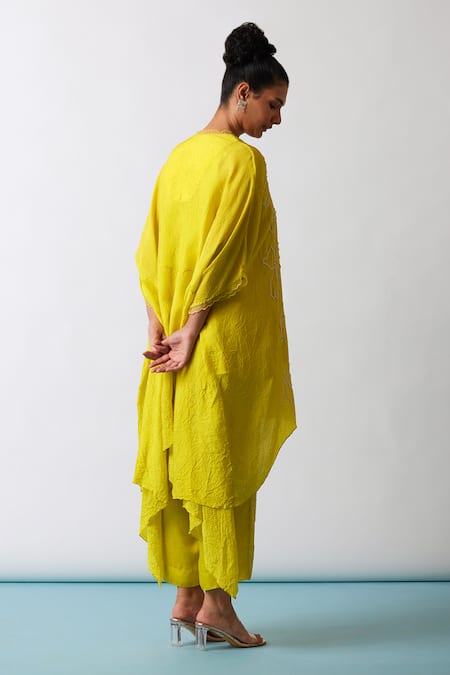Shop One Not Two Yellow Kaftan Viscose Silk Hand Embroidered Floral Asymmetric And Pant Set at Aza Fashions Shop_One Not Two_Yellow Kaftan Viscose Silk Hand Embroidered Floral Asymmetric And Pant Set _at_Aza_Fashions