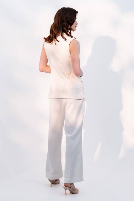 Shop Enness Studio Blue Banana Crepe Lapel Collar Charlotte Sleeveless Blazer And Pant Set at Aza Fashions Shop_Enness Studio_Blue Banana Crepe Lapel Collar Charlotte Sleeveless Blazer And Pant Set_at_Aza_Fashions