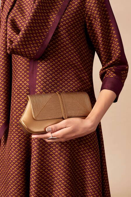 Ampm_Gold Crystals Izrah Cord Embellished Clutch _at_Aza_Fashions