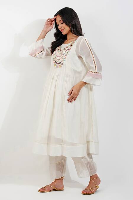 Shop_Devyani Mehrotra_Ivory Chanderi, Viscose Beads Round Flirty Pleats Shabby A Line Tunic And Pant Set_Online_at_Aza_Fashions