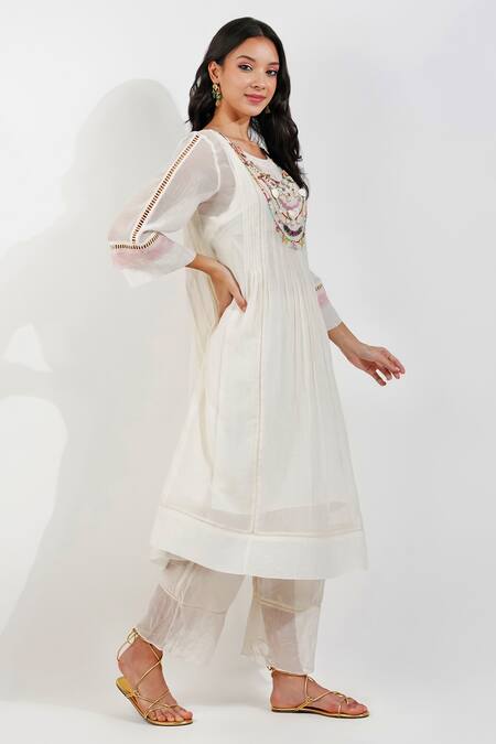 Devyani Mehrotra_Ivory Chanderi, Viscose Beads Round Flirty Pleats Shabby A Line Tunic And Pant Set_at_Aza_Fashions