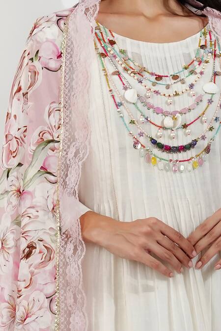 Devyani Mehrotra_Ivory Chanderi, Viscose Beads Round Flirty Pleats Shabby A Line Tunic Pant Set_Online_at_Aza_Fashions