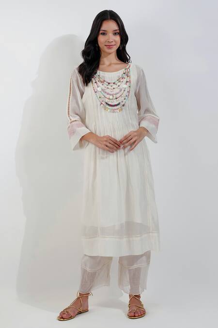 Shop_Devyani Mehrotra_Ivory Chanderi, Viscose Beads Round Flirty Pleats Shabby A Line Tunic Pant Set_Online_at_Aza_Fashions