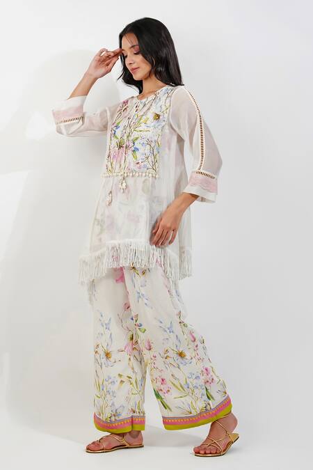 Devyani Mehrotra_Ivory Chanderi, Muslin Embroidery Summer Floral Print Kurta And Flared Pant Set_at_Aza_Fashions