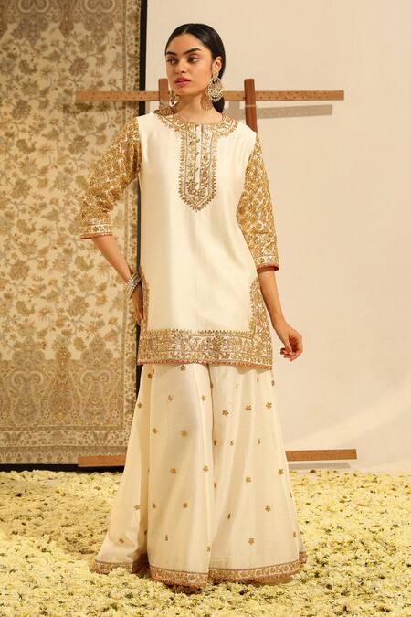 Buy Sheetal Batra Ivory Silk Organza, Silk, Chanderi Shadaab Gota Patti Kurta Sharara Set Online at Aza Fashions Buy_Sheetal Batra_Ivory Silk Organza, Silk, Chanderi Shadaab Gota Patti Kurta Sharara Set _Online_at_Aza_Fashions
