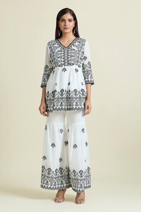 Naintara Bajaj_White Cotton Mirrors, Sequins, Embroidery V-neck Peplum Kurta And Sharara Set_Online_at_Aza_Fashions