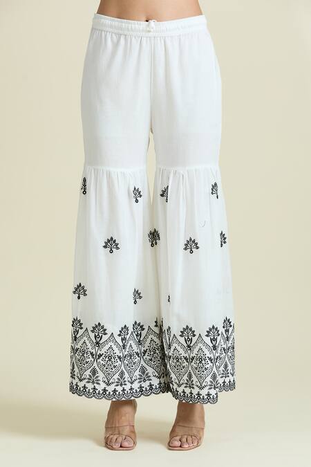 Naintara Bajaj_White Cotton Mirrors, Sequins, Embroidery V-neck Peplum Kurta And Sharara Set_at_Aza_Fashions