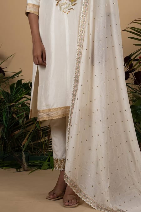 Blue Lotus Design_White Cotton, Silk Embroidery, Sequins Scoop Neck Floral Kurta Pant Set _Online_at_Aza_Fashions