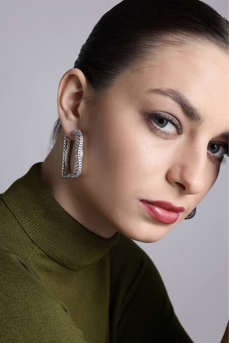 Shazé_Silver Plated Cut Work Dawns Beams Geometric Carved Hoops_Online_at_Aza_Fashions