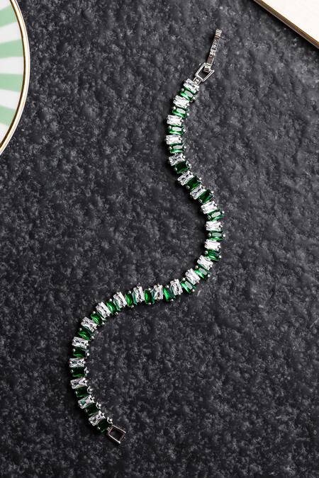 Shop Shazé Silver Plated Stones Starstream Geometric Carved Cutwork Bracelet at Aza Fashions Shop_Shazé_Silver Plated Stones Starstream Geometric Carved Cutwork Bracelet_at_Aza_Fashions