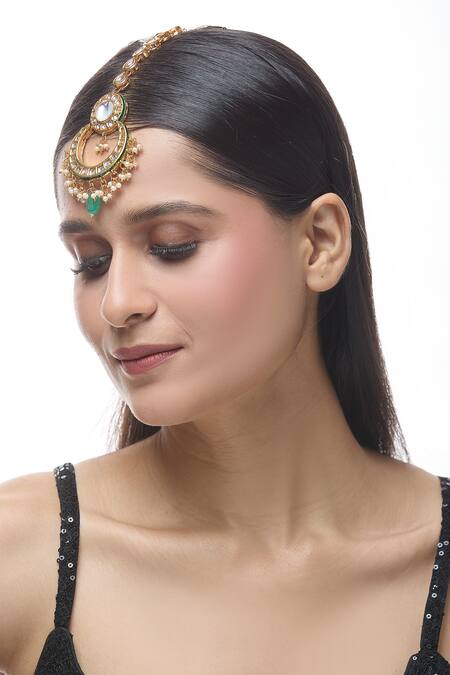 Just Shradhas Gold Plated Crescent Moon Carved Maangtikka at Aza Fashions Just Shradhas_Gold Plated Crescent Moon Carved Maangtikka _at_Aza_Fashions