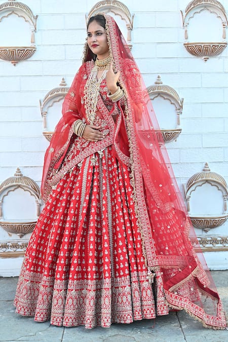 Buy Tanushavy Couture Red Silk, Net, Cotton Zari, Beads, Sequins, Floret Butti Bridal Lehenga Set Buy_Tanushavy Couture_Red Silk, Net, Cotton Zari, Beads, Sequins, Floret Butti Bridal Lehenga Set