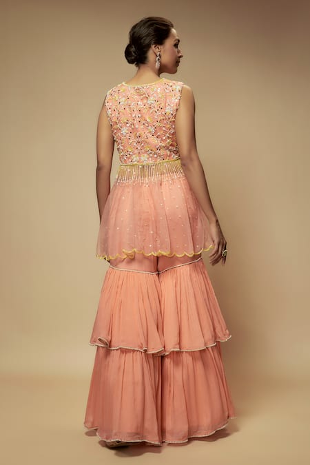 Shop Keith Gomes Peach Chiffon, Crepe Pearls, Floral Embellished Peplum Tunic With Gharara at Aza Fashions Shop_Keith Gomes_Peach Chiffon, Crepe Pearls, Floral Embellished Peplum Tunic With Gharara _at_Aza_Fashions