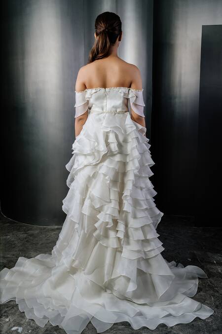 Shop_Shriya Som_Ivory Tulle Ruffles, Pearls Off-shoulder Embellished Tiered Gown _at_Aza_Fashions
