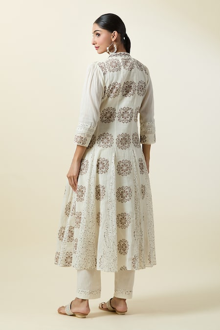 Shop Samyukta Singhania Off White Muslin, Cotton Tassels, Mirrors Floral Butti Print Kurta With Pant at Aza Fashions Shop_Samyukta Singhania_Off White Muslin, Cotton Tassels, Mirrors Floral Butti Print Kurta With Pant_at_Aza_Fashions
