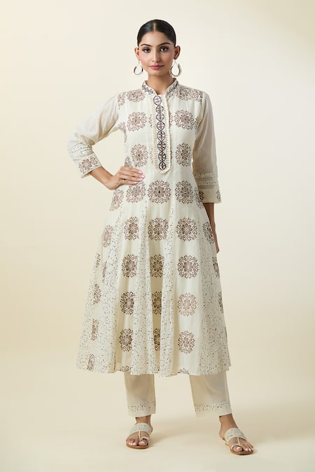 Buy Samyukta Singhania Off White Muslin, Cotton Tassels, Mirrors Floral Butti Print Kurta With Pant Online at Aza Fashions Buy_Samyukta Singhania_Off White Muslin, Cotton Tassels, Mirrors Floral Butti Print Kurta With Pant_Online_at_Aza_Fashions